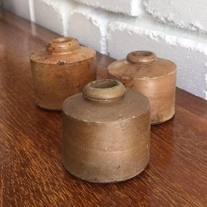 Set of three salt-glazed stoneware penny inkwells